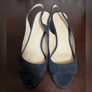 Navy blue open toed sling backs.